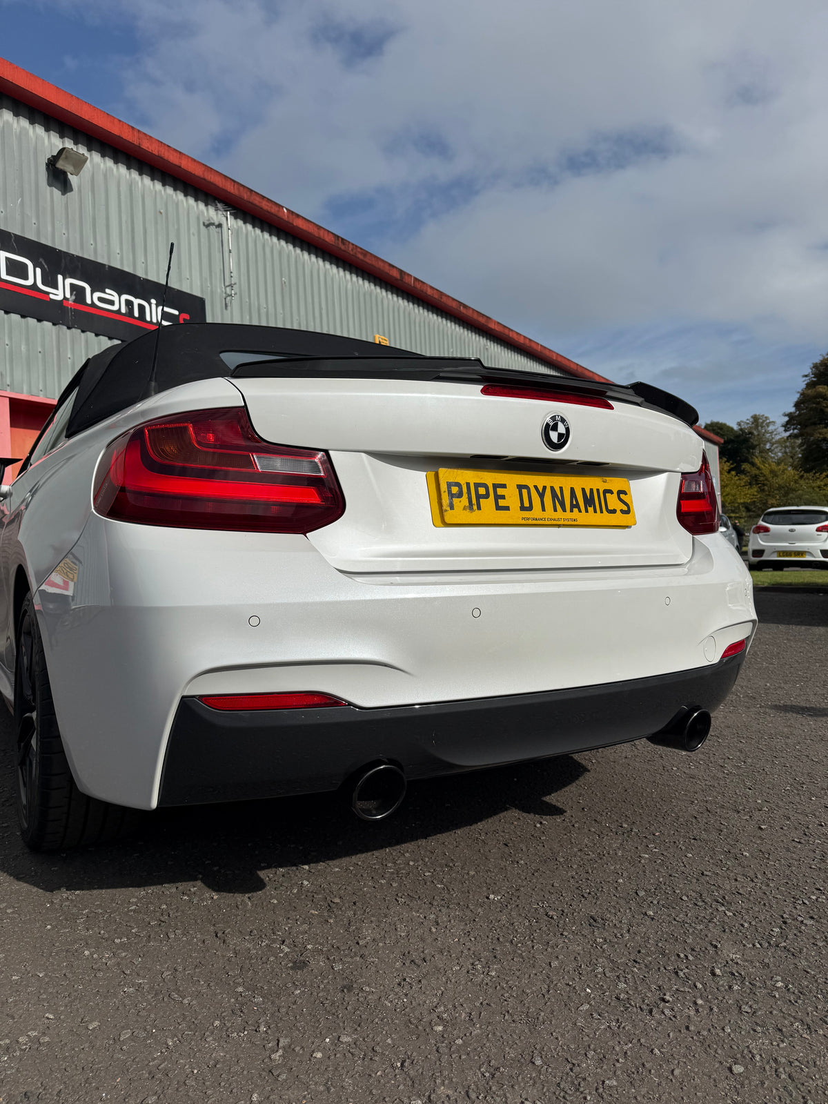 White BMW 2 Series Convertible rear view parked outdoors, 220D WITH PIPE DYNAMICS EXHAUST